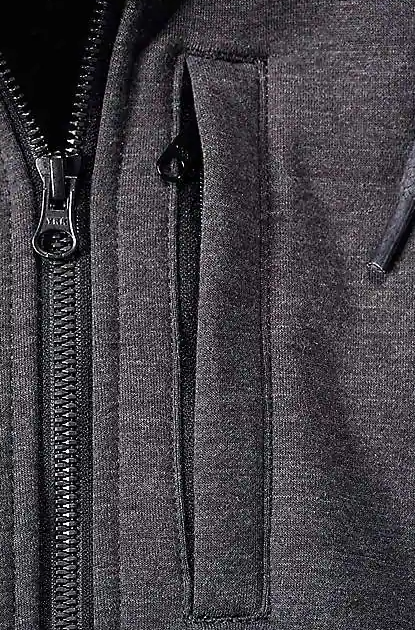 Carhartt Huppari Wind Fighter Carbon Heather Fleecevuorattu veden- ja tuulenpitava huppari. Kolmiosainen huppu ja saadettava