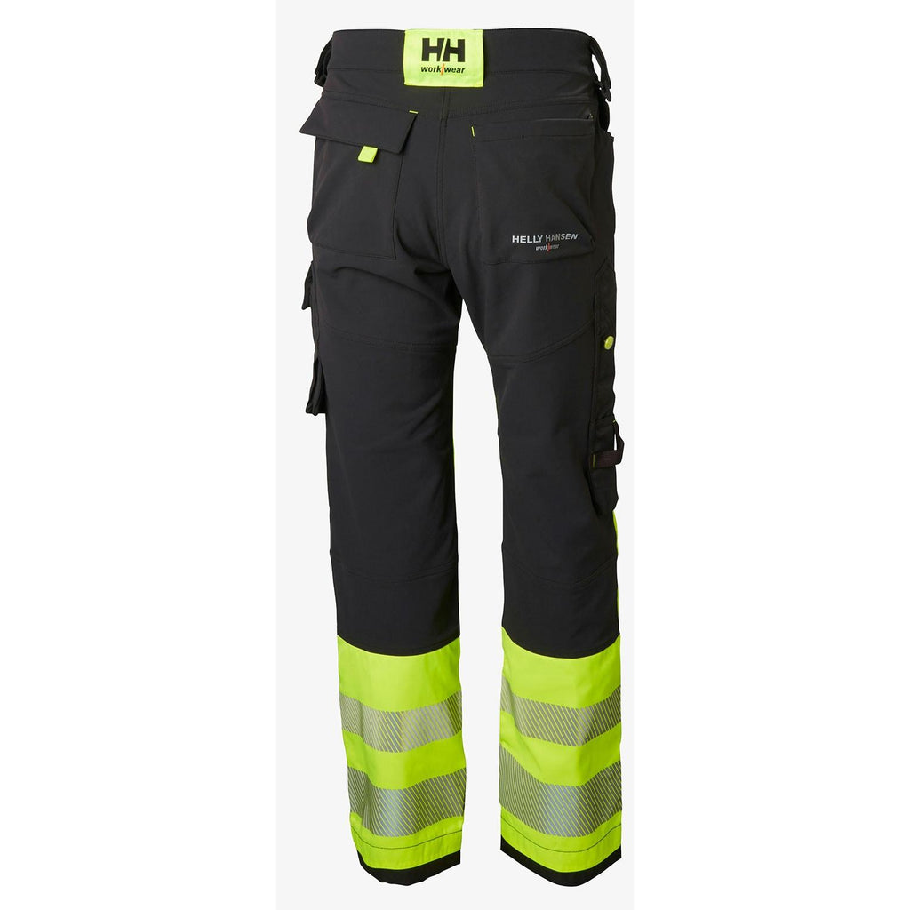 Helly Hansen Work Wear Icu Huomio Riipputaskuhousut 1 Lk. keltainen/harmaa Kestava neljaan suuntaan joustava kangas nayttaa