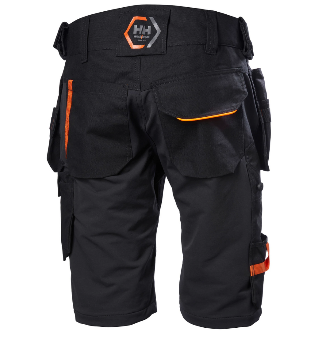 Helly Hansen Work Wear Chelsea Evolution Riipputaskushortsit NAVY Chelsea Evolution -rakentajanshortseissa on neljaan