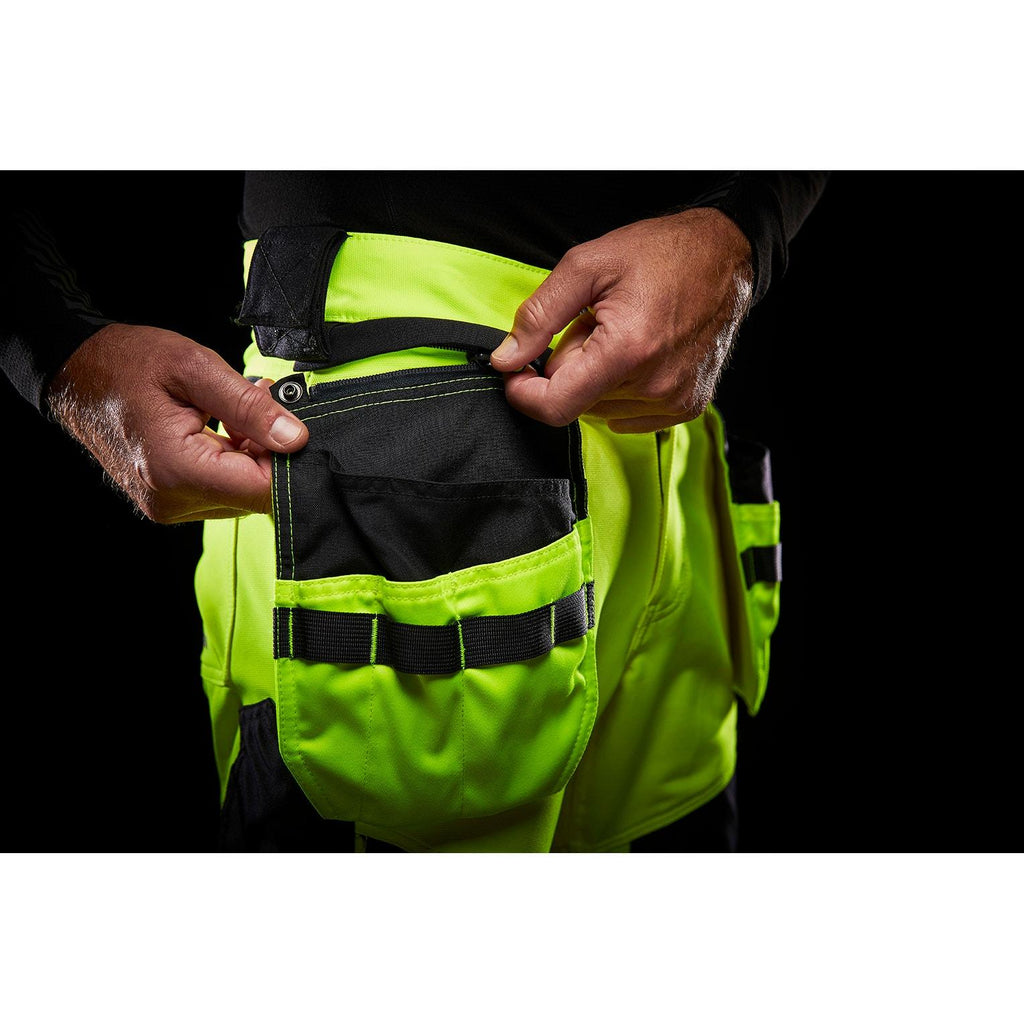 Helly Hansen Work Wear Icu Huomio Riipputaskuhousut 2 Lk. keltainen/harmaa Neljaan suuntaan joustavat ICU-housut. EN20471